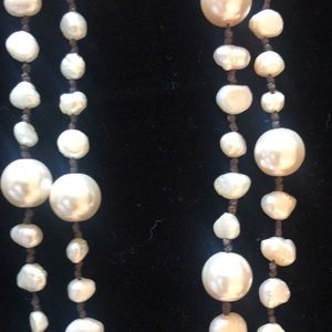 Long strand pearl necklace